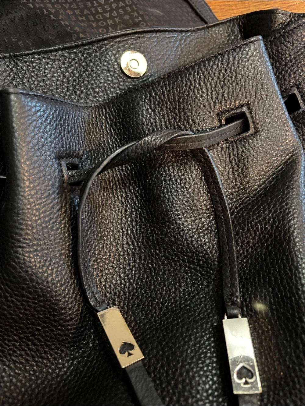 kate spade Black Pebbled Leather Drawstring Backpack Purse